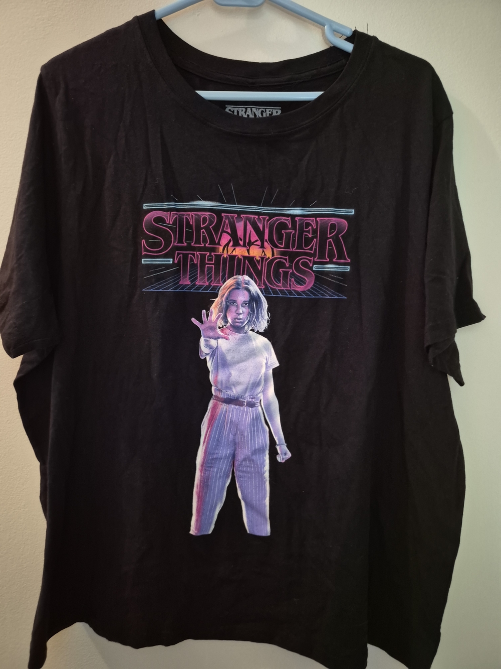 Stranger Things Black Tee with Pink & Blue Graphic